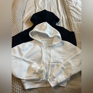 Black and white cropped zip ups